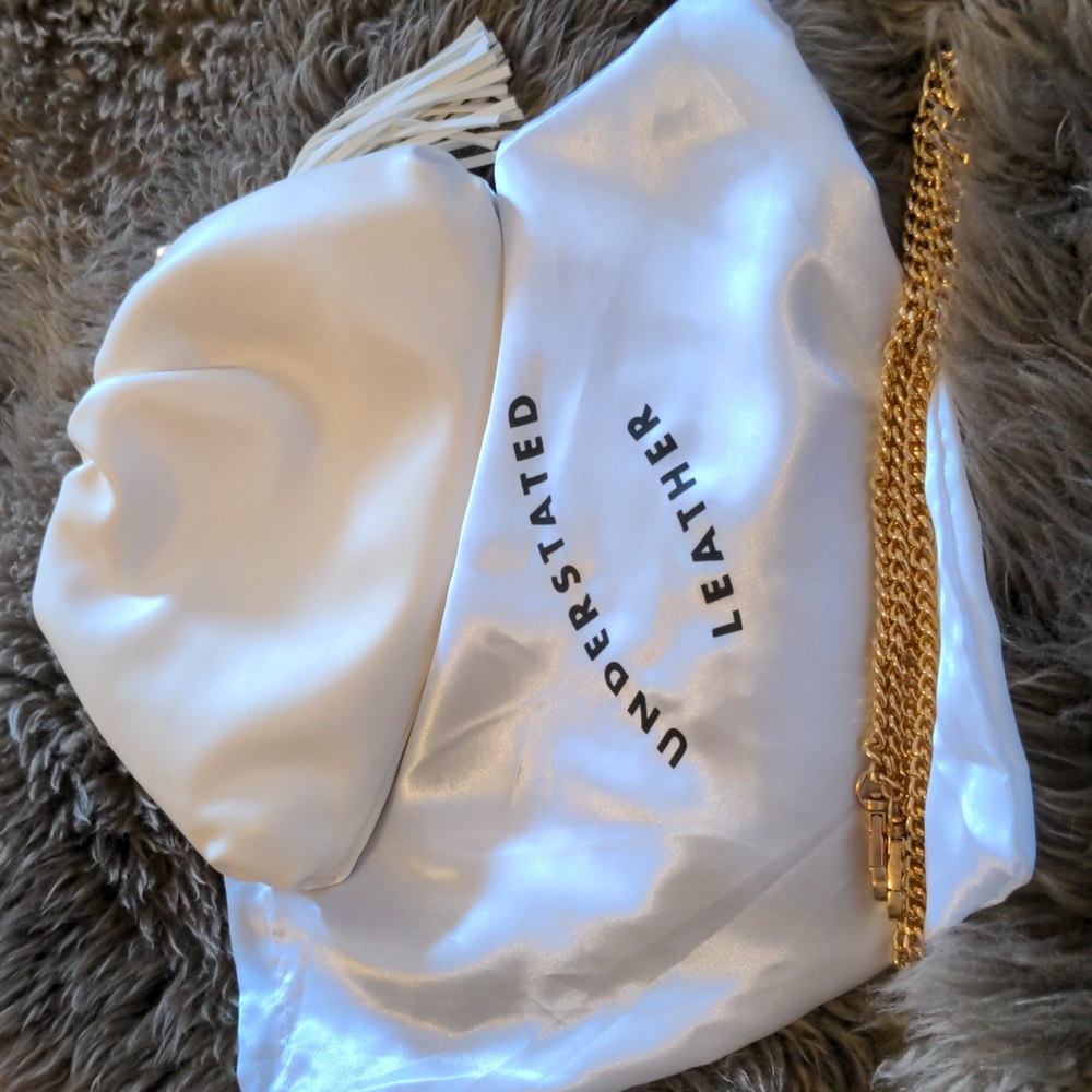 Understated Leather Vegan clutch